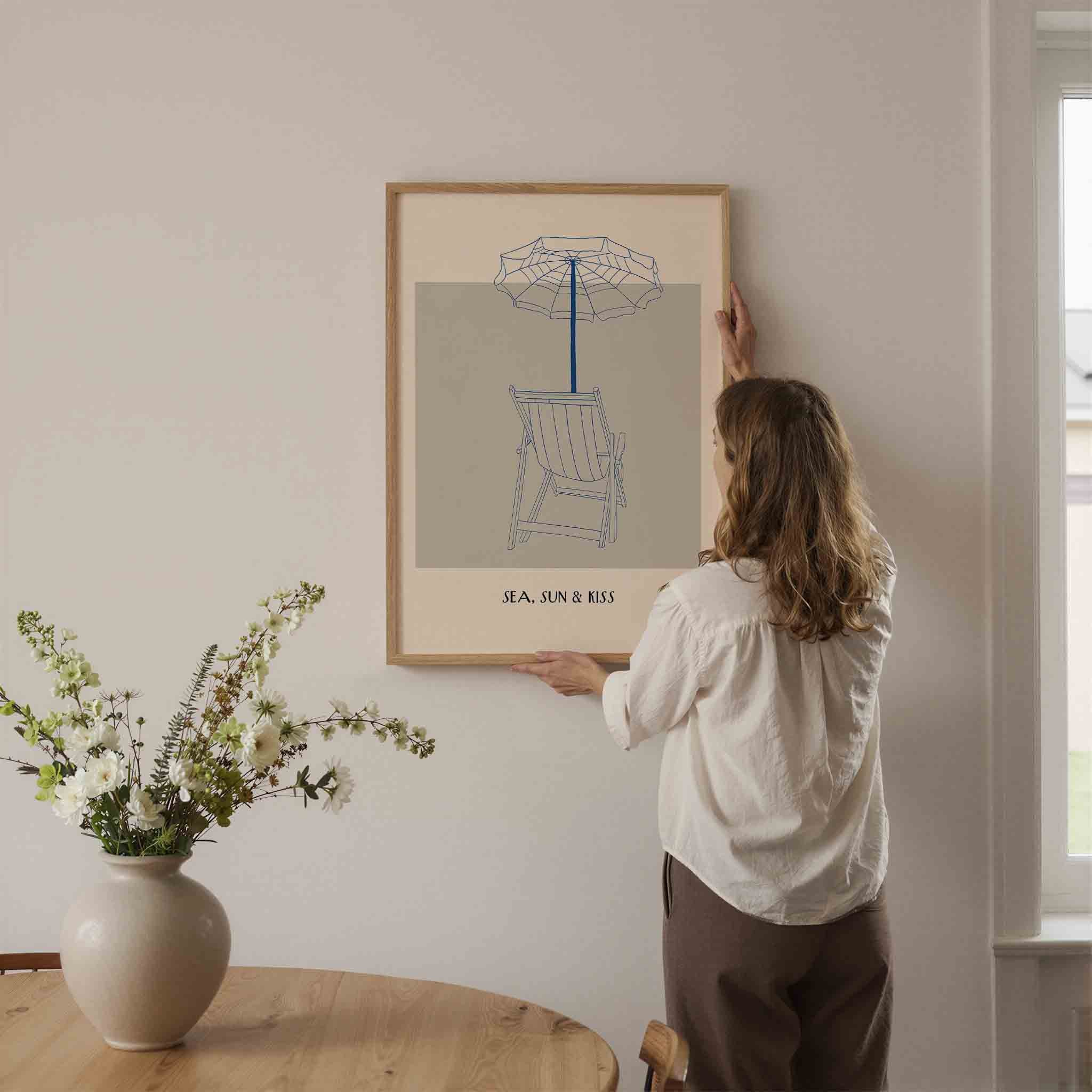 Strandstoel en parasol Poster