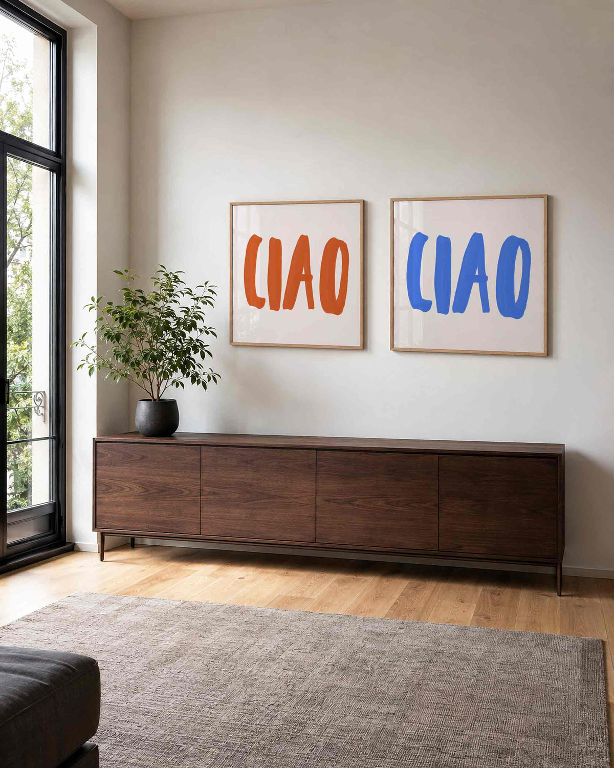 Interieurpresentatie van een tweedelige vierkante posterset met clap lettering