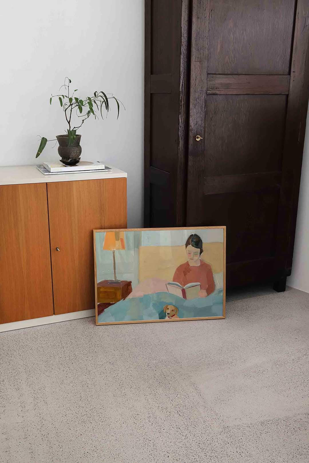 Lezende vrouw met hond Poster