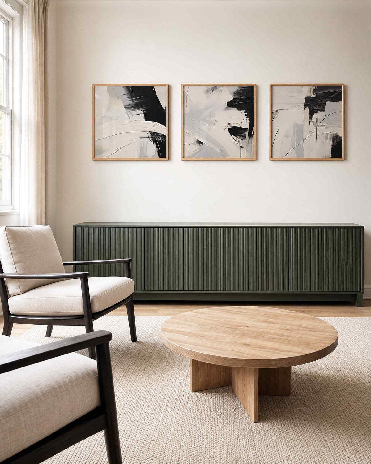 Interieurpresentatie van een driedelige vierkante posterset met zwart wit abstract