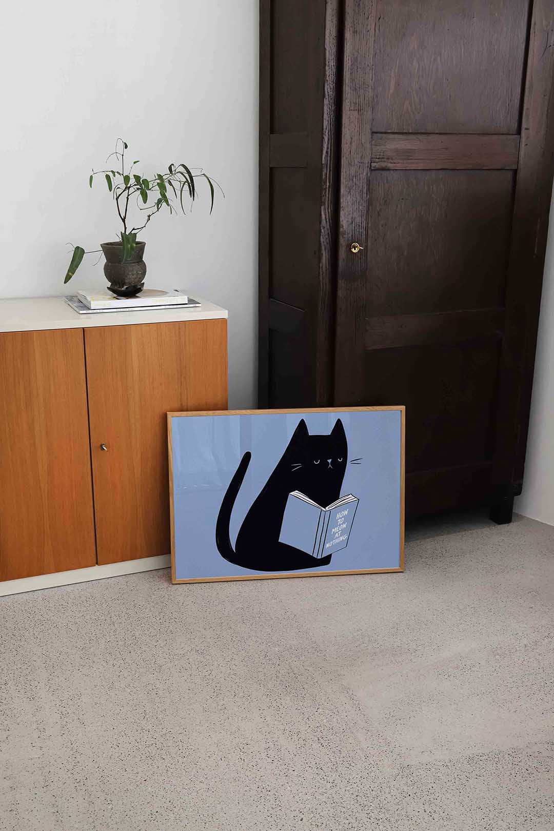 Zwarte kat met boek Poster