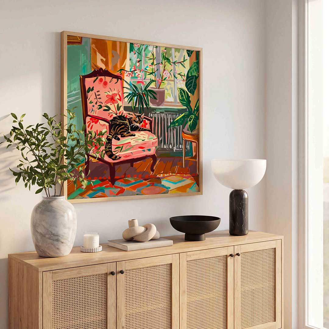Kat op bloemenstoel Poster