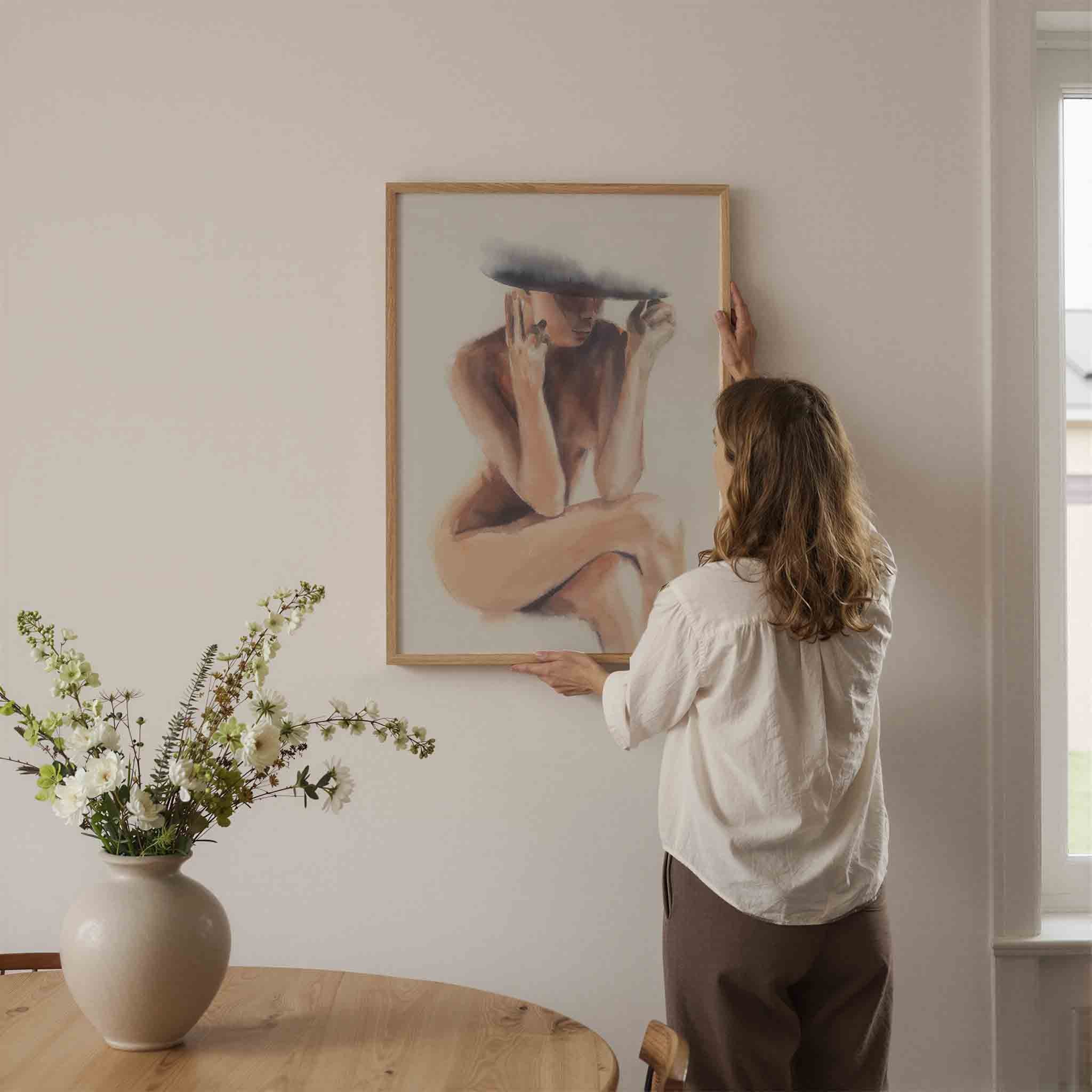 Zittende figuur met hoed Poster