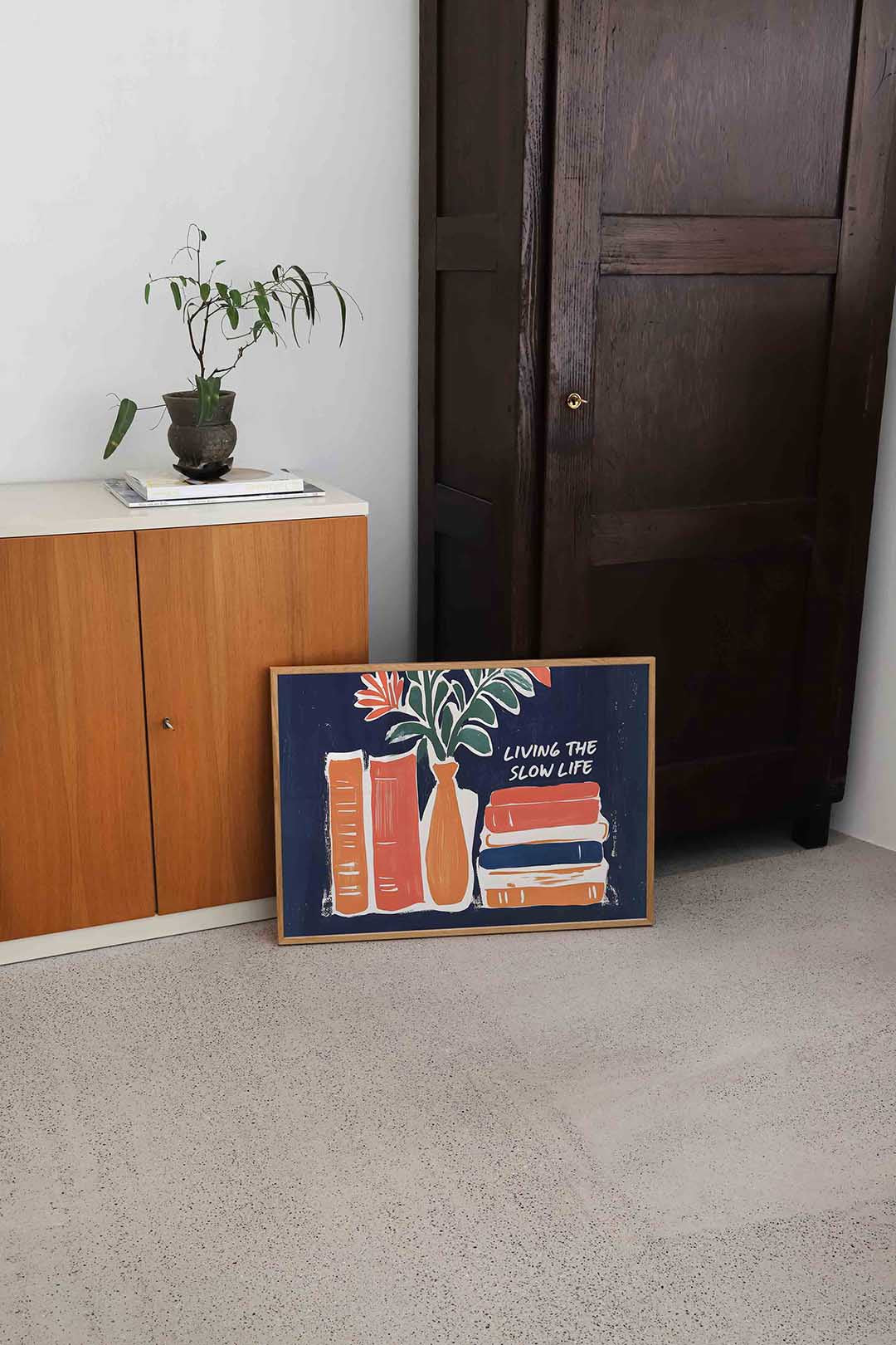 Boeken en vaas met bloemen Poster
