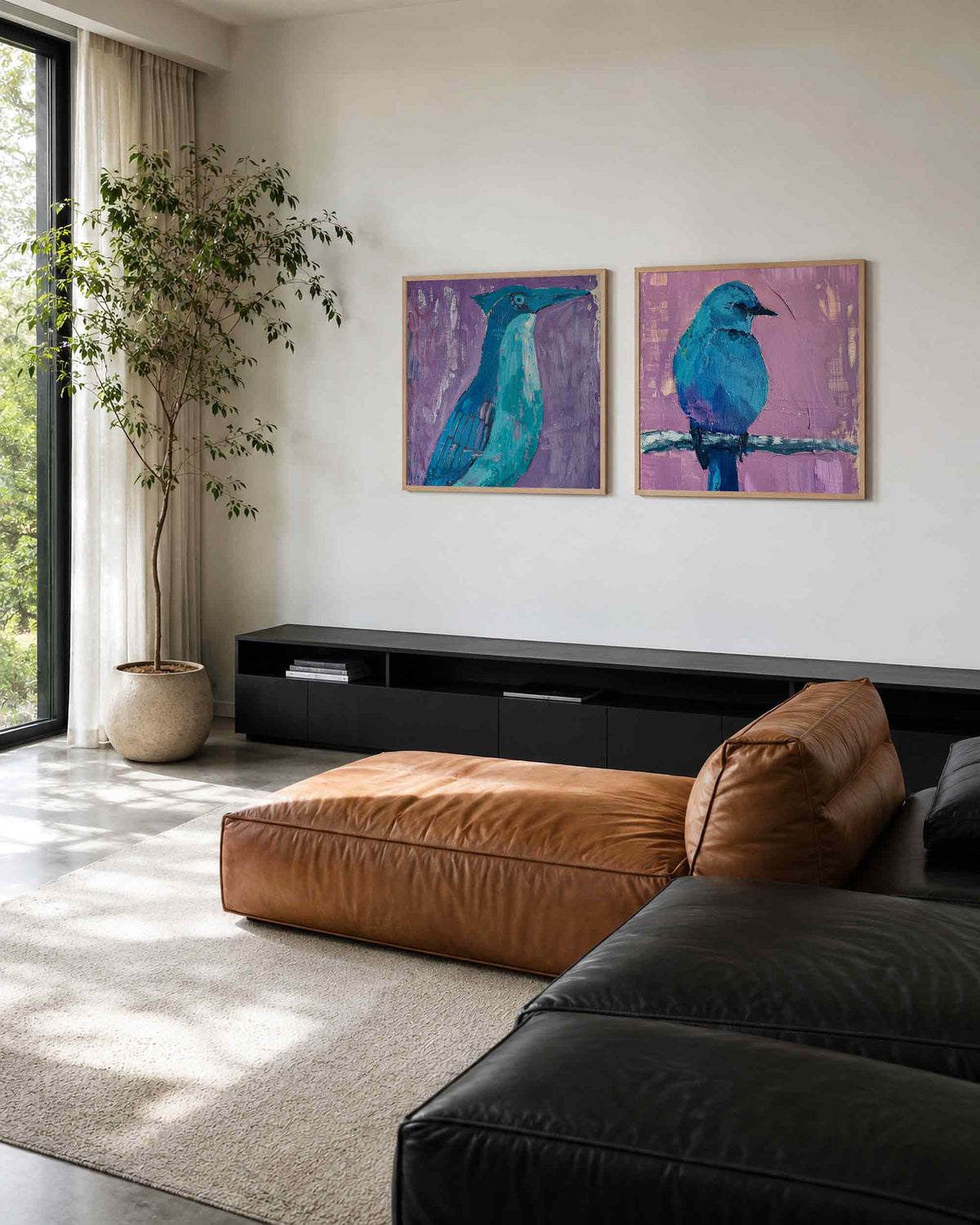 Interieurpresentatie van een tweedelige vierkante posterset met blauwe vogels